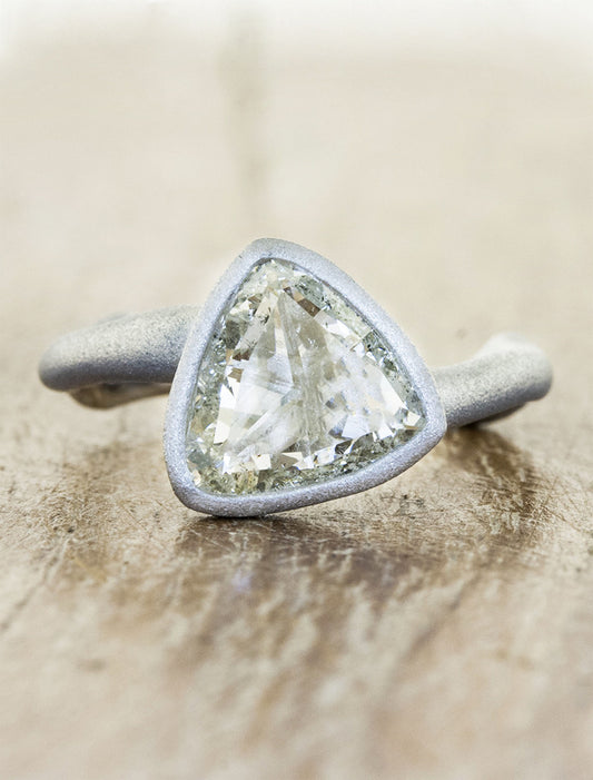 caption:Shown with trillion cut diamond in platinum