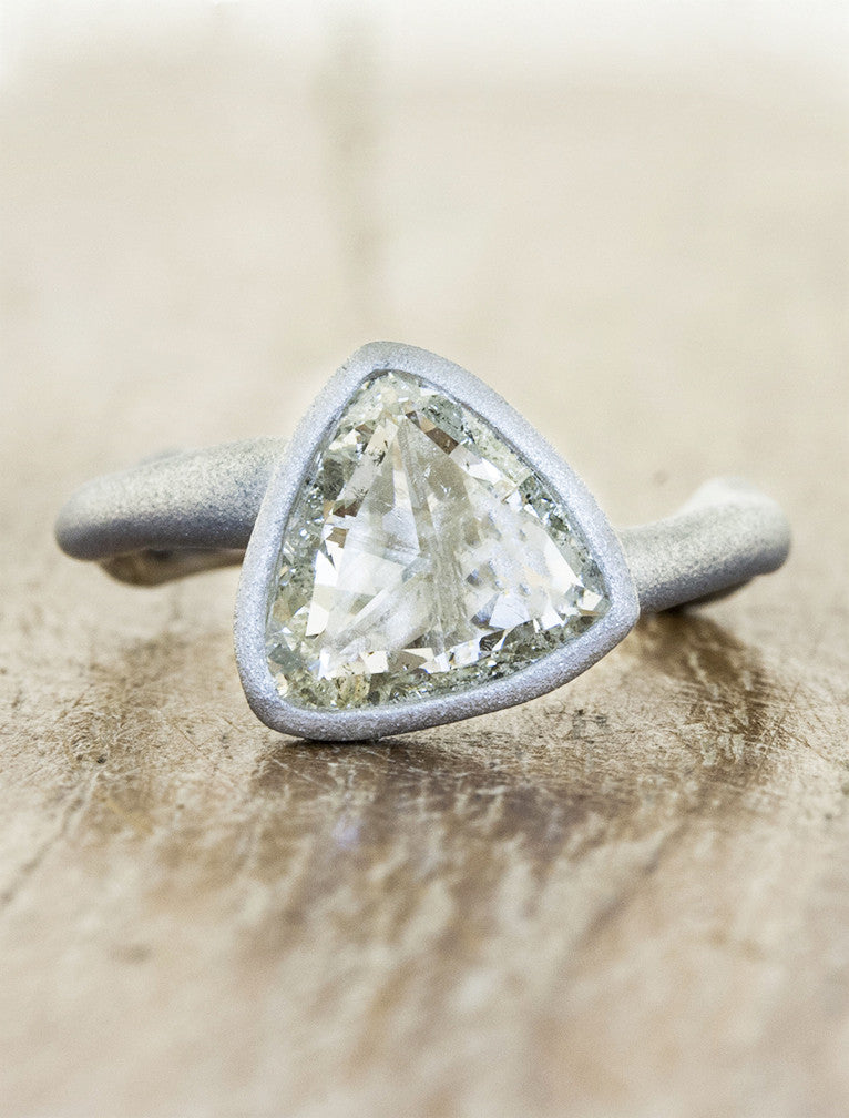 caption:Shown with trillion cut diamond in platinum