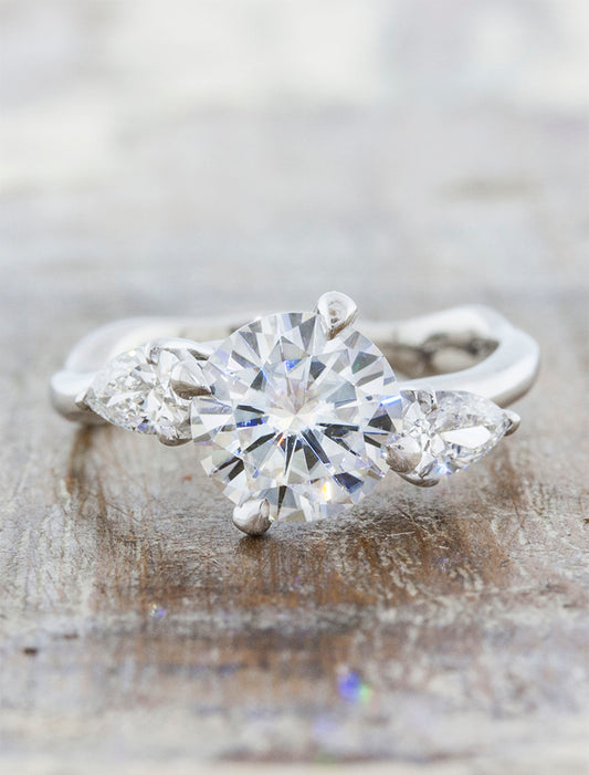 caption:Shown with 1.25ct round diamond in 14k white gold
