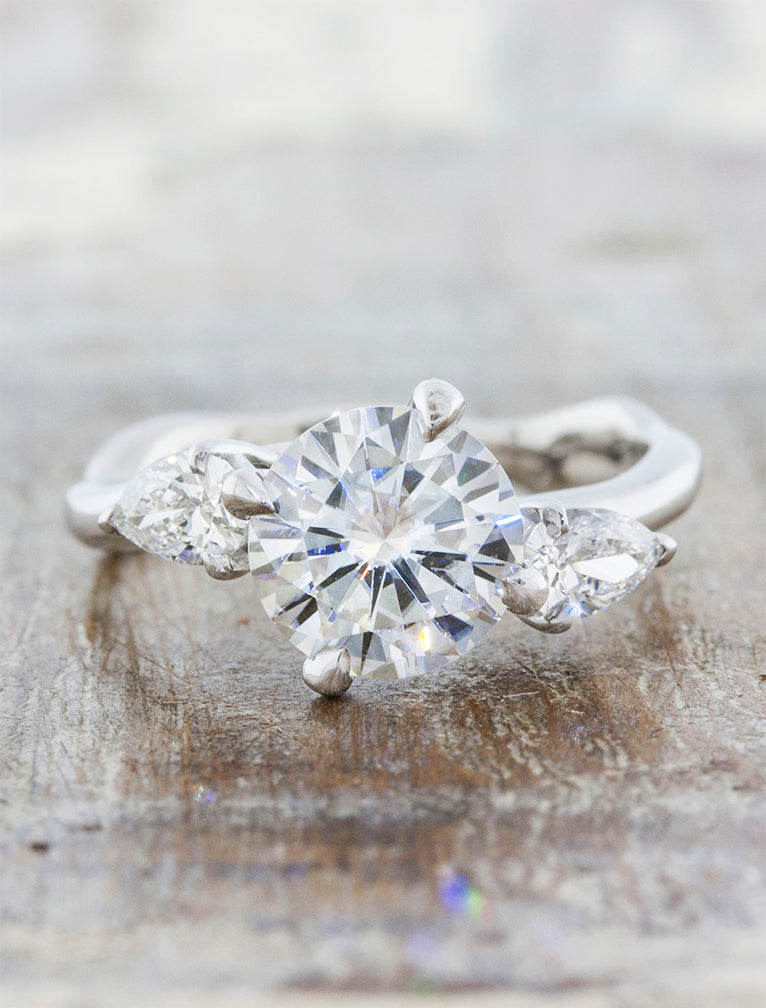 caption:Shown with 1.25ct round diamond in 14k white gold