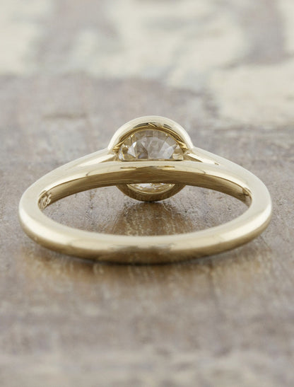 modern bezel set round diamond yellow gold ring - cathedral setting