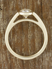 modern bezel set round diamond yellow gold ring - top view