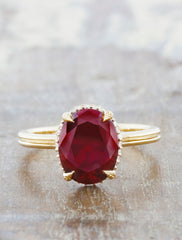 Nature inspired solitaire double band;caption:1.90ct. Oval Ruby 14k Yellow Gold