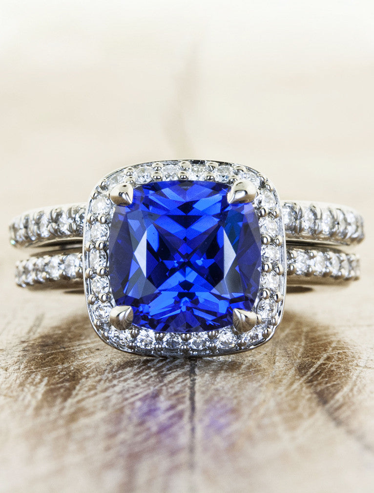 cultured blue sapphire, halo setting in palladium band