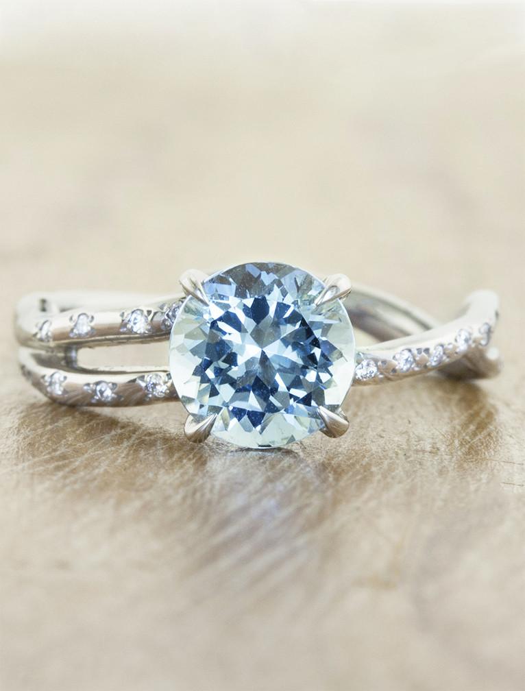 caption:Customized with round aquamarine in platinum