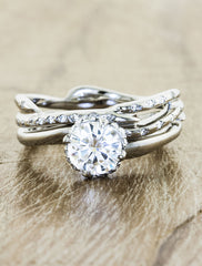 Nature inspired engagement ring hidden halo;caption:0.95ct. Round Diamond 14k White Gold paired with Selene wedding band
