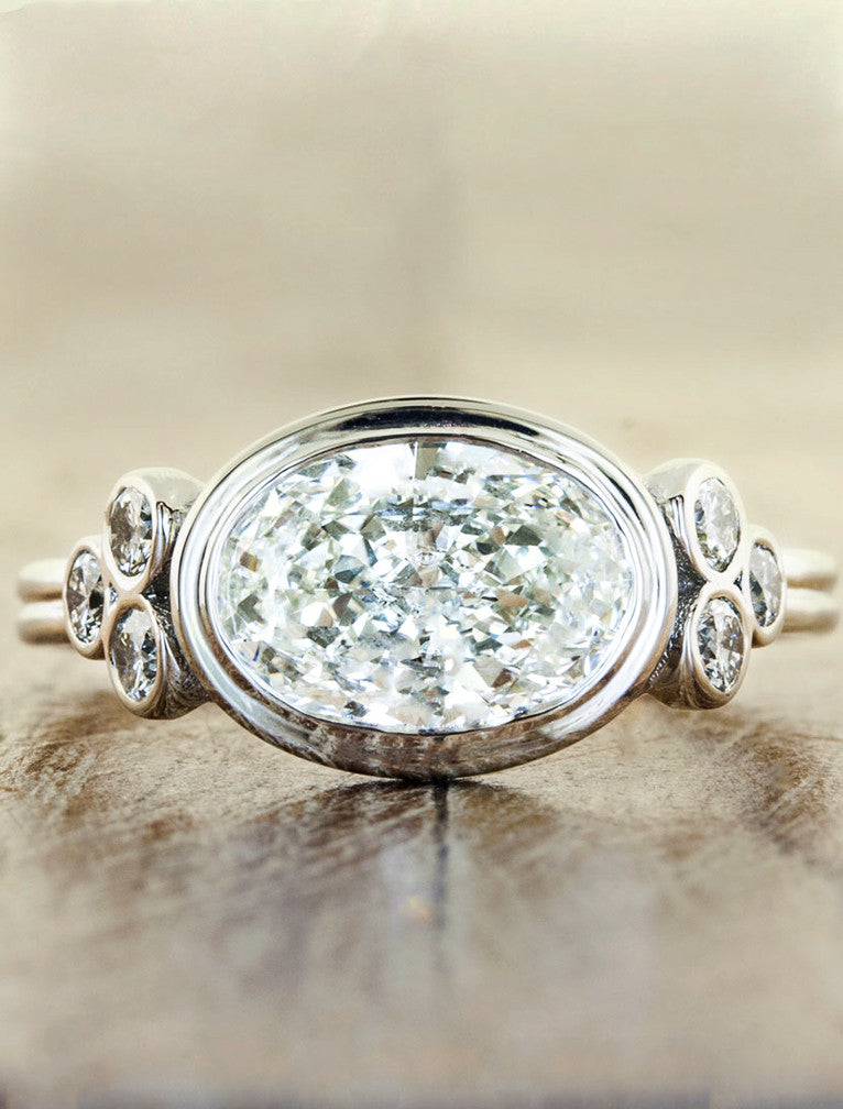 caption:Shown with oval diamond in platinum
