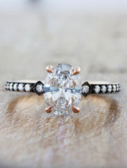 oval vintage inspired engagement ring;caption:1.26ct. Oval Diamond 14k Rose Gold with black rhodium plating