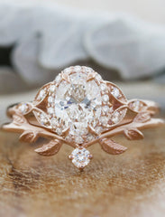 rose gold leafy wedding band with diamond accent and engagement ring. caption:Shown with Rachael engagement ring