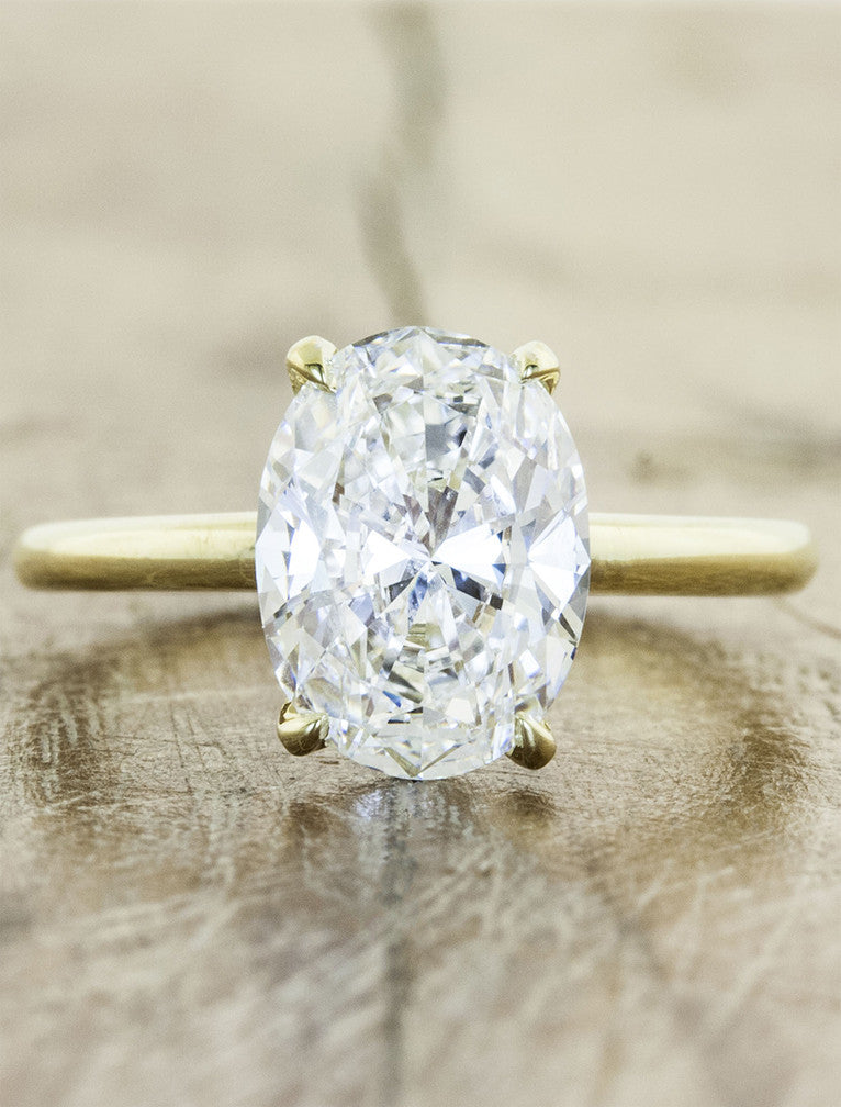 caption:Shown with 2ct oval diamond in 14k yellow gold