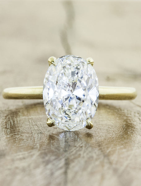 Classic solitaire - Ariya caption:Shown with a 2.00ct. Oval Diamond, 14k Yellow Gold