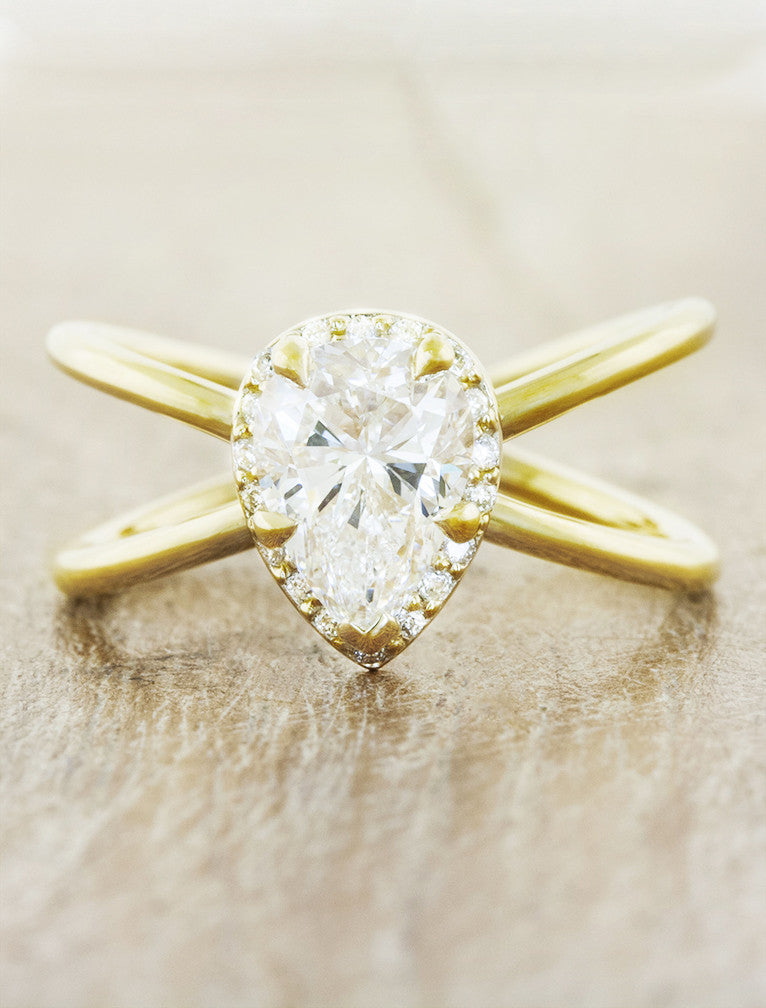 modern pear diamond and yellow gold engagement ring