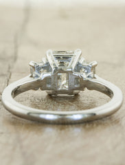 classic three stone emerald cut diamond engagement ring
