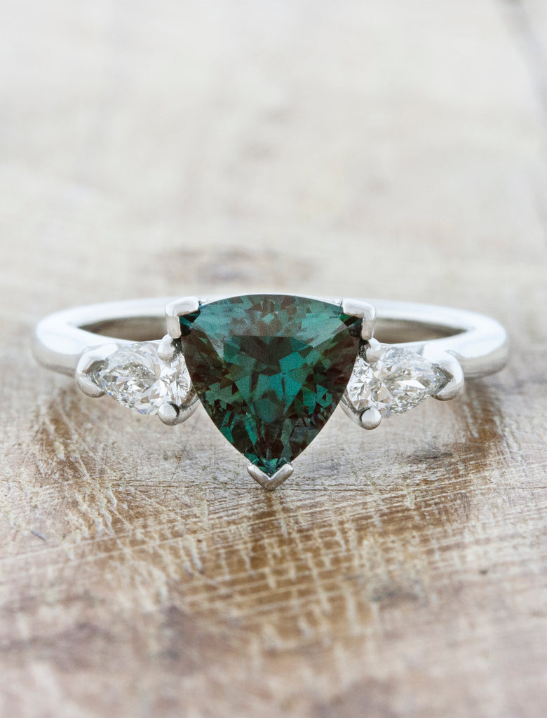 caption:Customized with a trillion shape green sapphire