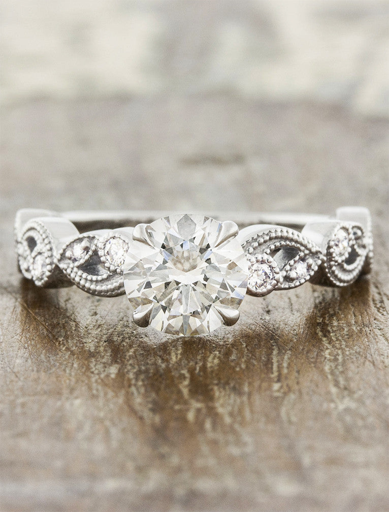 caption:Shown with 1ct round diamond in platinum