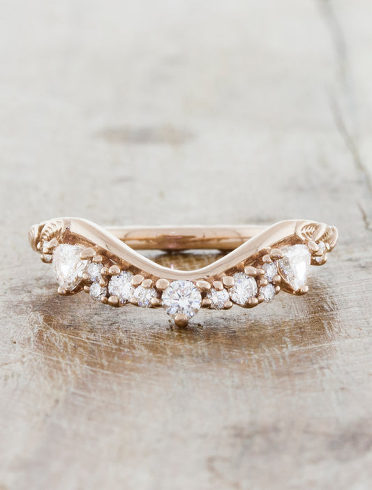 curved wedding band with trillion diamonds