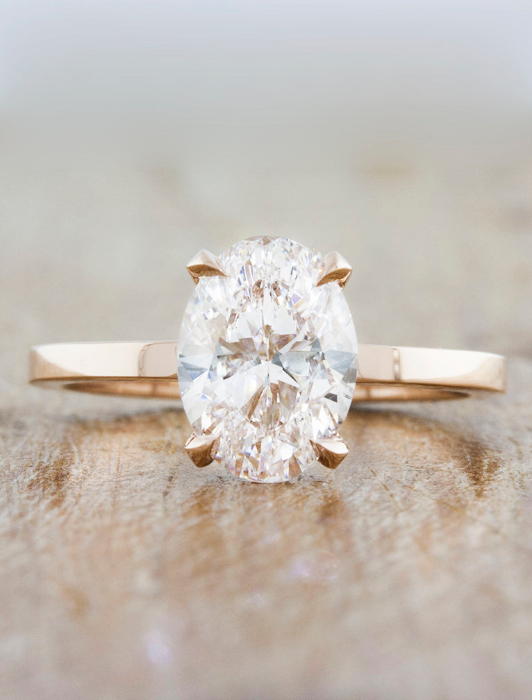 caption:Shown with 1.5ct oval diamond in 14k rose gold