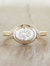 caption:Shown with oval diamond in rose gold
