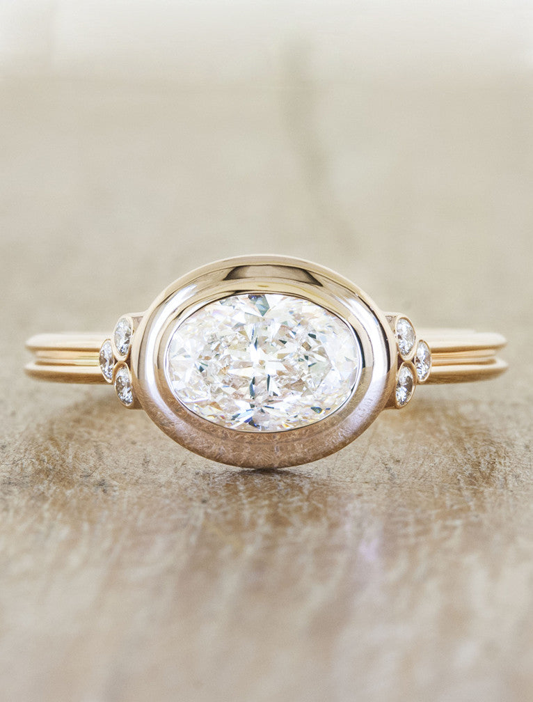 caption:Shown with oval diamond in rose gold