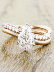 pear shaped diamond ring wave band yellow gold;caption:1.30ct. Pear Diamond 14k Rose Gold paired with Bella wedding band