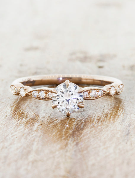 round diamond in a vintage-inspired, encrusted diamond band. caption:Shown in 14k rose gold with 0.50ct option