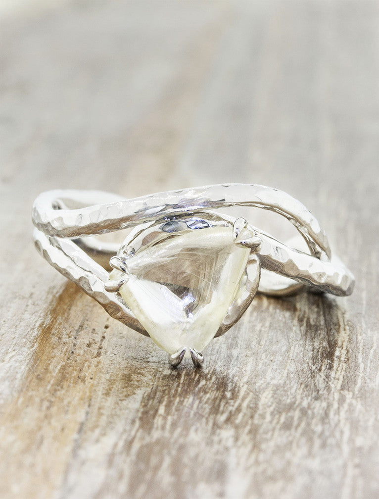 organic inspired raw diamond ring, asymmetrical band caption: Diamond Maccle paired with Kilor wedding band in Platinum
