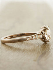 european cut round diamond, rose gold intricate setting engagement ring