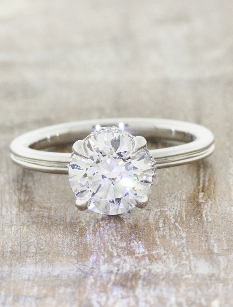 sleek modern band, diamond 4 prong engagement ring;caption:1.25ct. Round Diamond 14k White Gold
