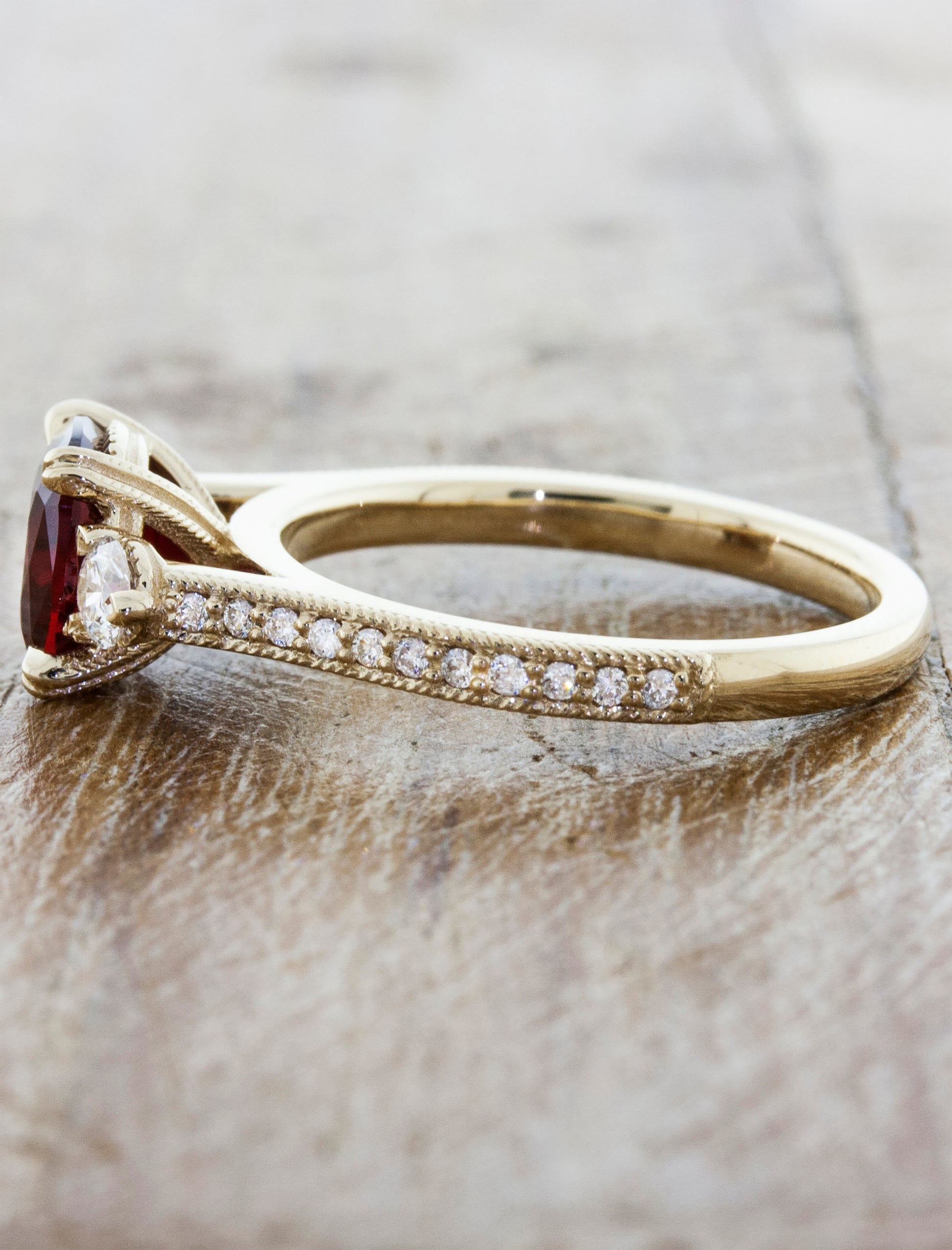 Three-Stone Cushion Cut Ruby Ring with Pave Band