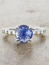 caption:Customized with a blue sapphire in platinum