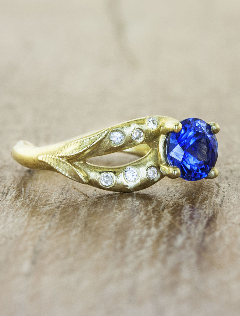 sapphire engagement ring, gold asymmetric band with diamonds