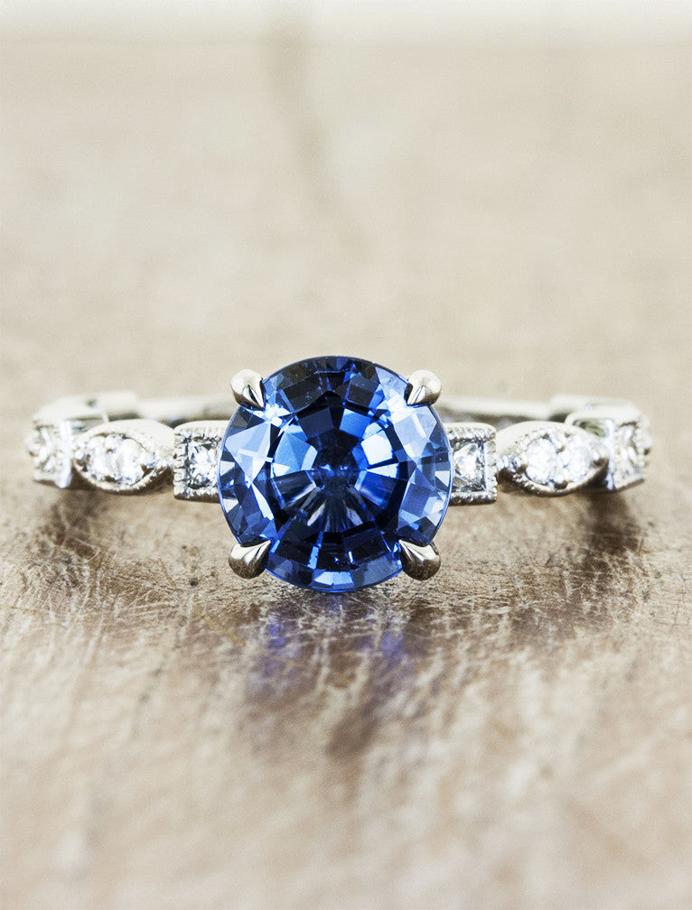Vintage inspired designs. caption:Customized with a 1.50ct. Round Sapphire 14k White Gold