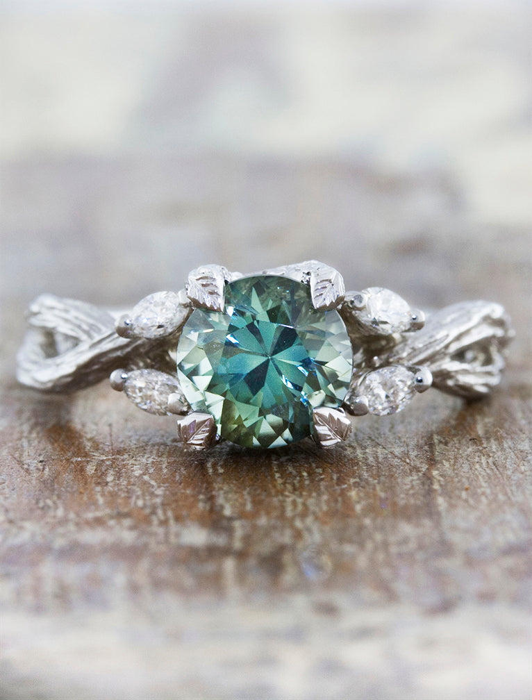 caption:Shown in platinum with round Montana sapphire