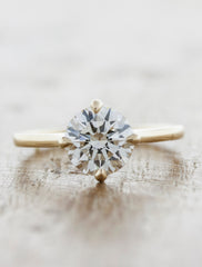 modern diamond solitaire engagement ring. caption:Shown with 1ct diamond option, 14k yellow gold