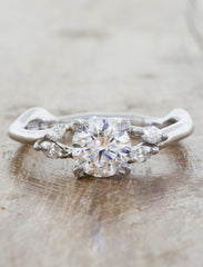 Nature inspired solitaire engagement ring caption:0.70ct. Round Diamond Platinum