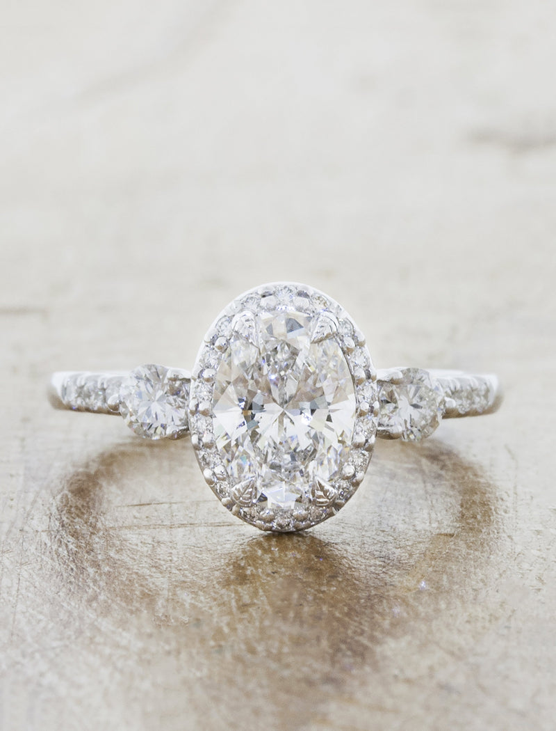 caption:Shown with 1ct oval diamond in platinum