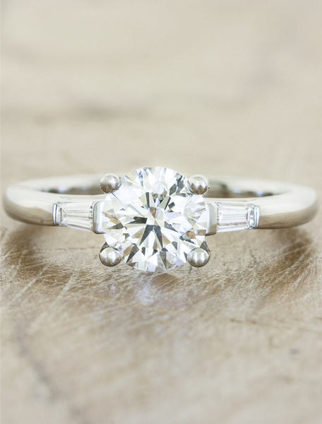 three stone diamond ring, baguette accents;caption:1.00ct. Round Diamond Platinum