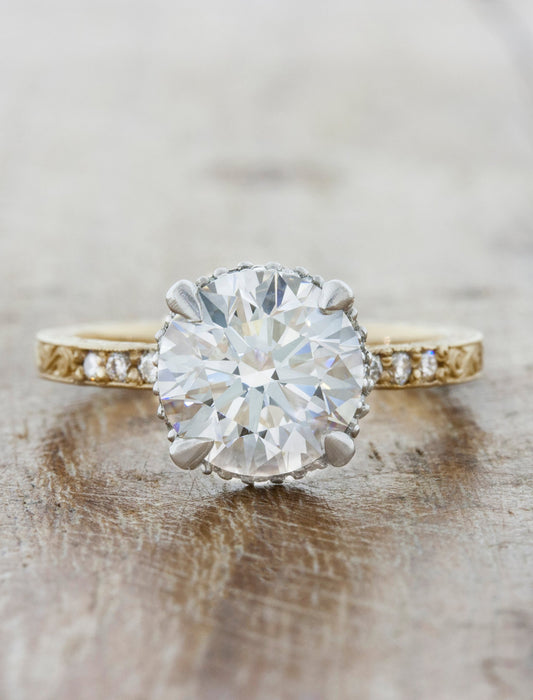 caption:Shown in 14k yellow gold band and platinum basket