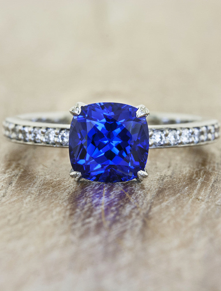 Classic solitaire pave band. caption:Customized with a 2.00ct. Cushion Cut Sapphire, platinum