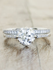 Vintage inspired collection caption: 0.86ct. Round Diamond Platinum paired with Hammie Wedding Band