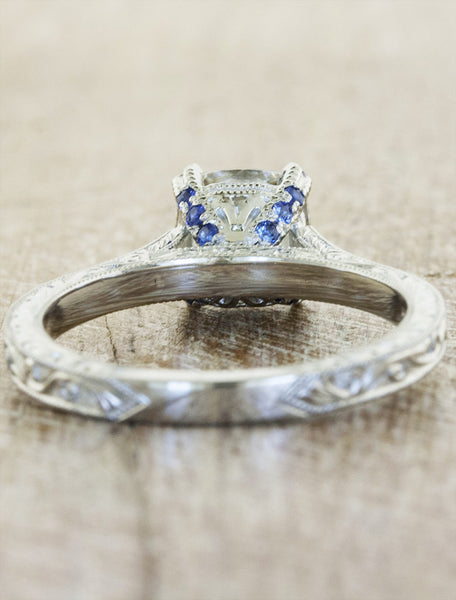 vintage inspired cushion cut diamond solitaire ring - subtle sapphire accents in setting
