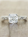 caption:Shown with 1.5ct cushion cut  in platinum