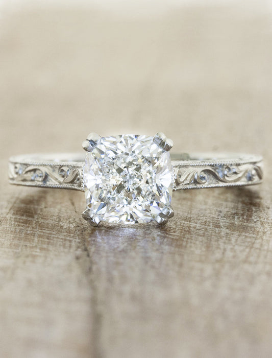 caption:Shown with 1.5ct cushion cut  in platinum
