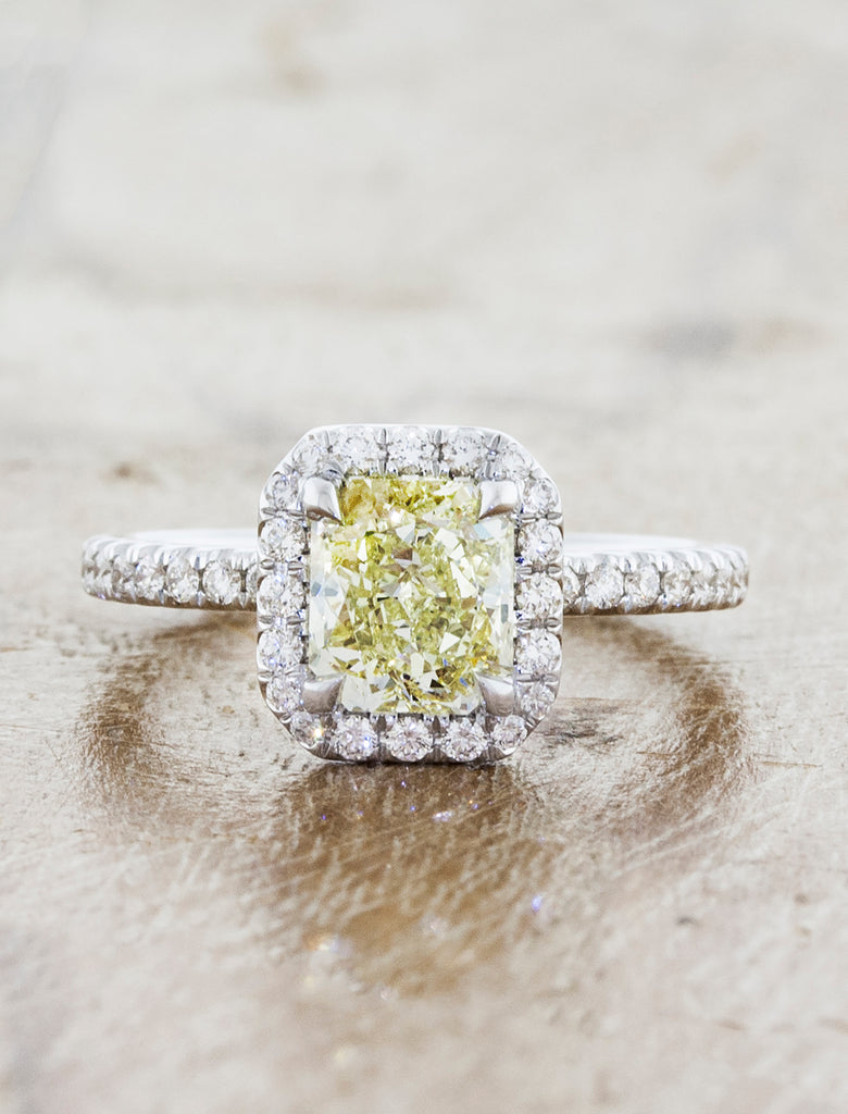 Emerald cut halo. caption:Customized with a 1.50ct. Radiant Cut Fancy yellow Diamond 14k White Gold
