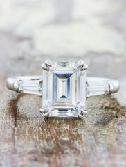 Three stone emerald diamond engagement ring