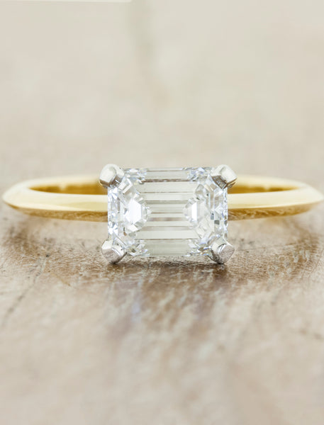 Mixed metal solitaire caption:1.00ct. Emerald Cut Diamond 14k Yellow Gold and Platinum. caption:Shown with a 1ct emerald cut diamond