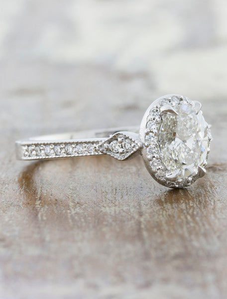 Oval diamond halo engagement ring