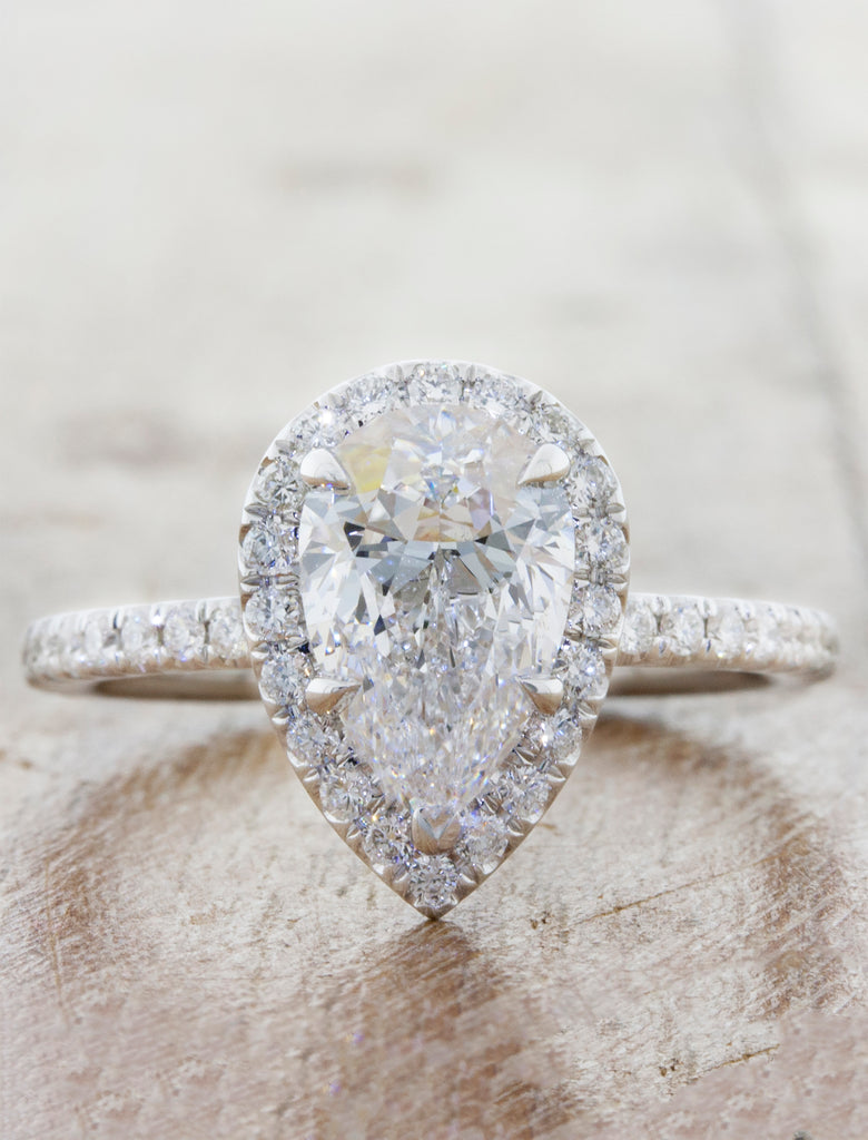 Halo engagement ring caption:1.70ct. Pear Shaped Diamond 14k White Gold