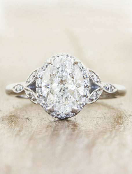 caption:Shown with 1.70ct. oval diamond in platinum