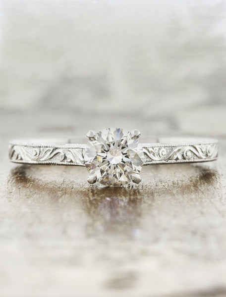 vintage inspired cushion cut diamond solitaire ring;caption:0.60ct. Round Diamond 14k White Gold